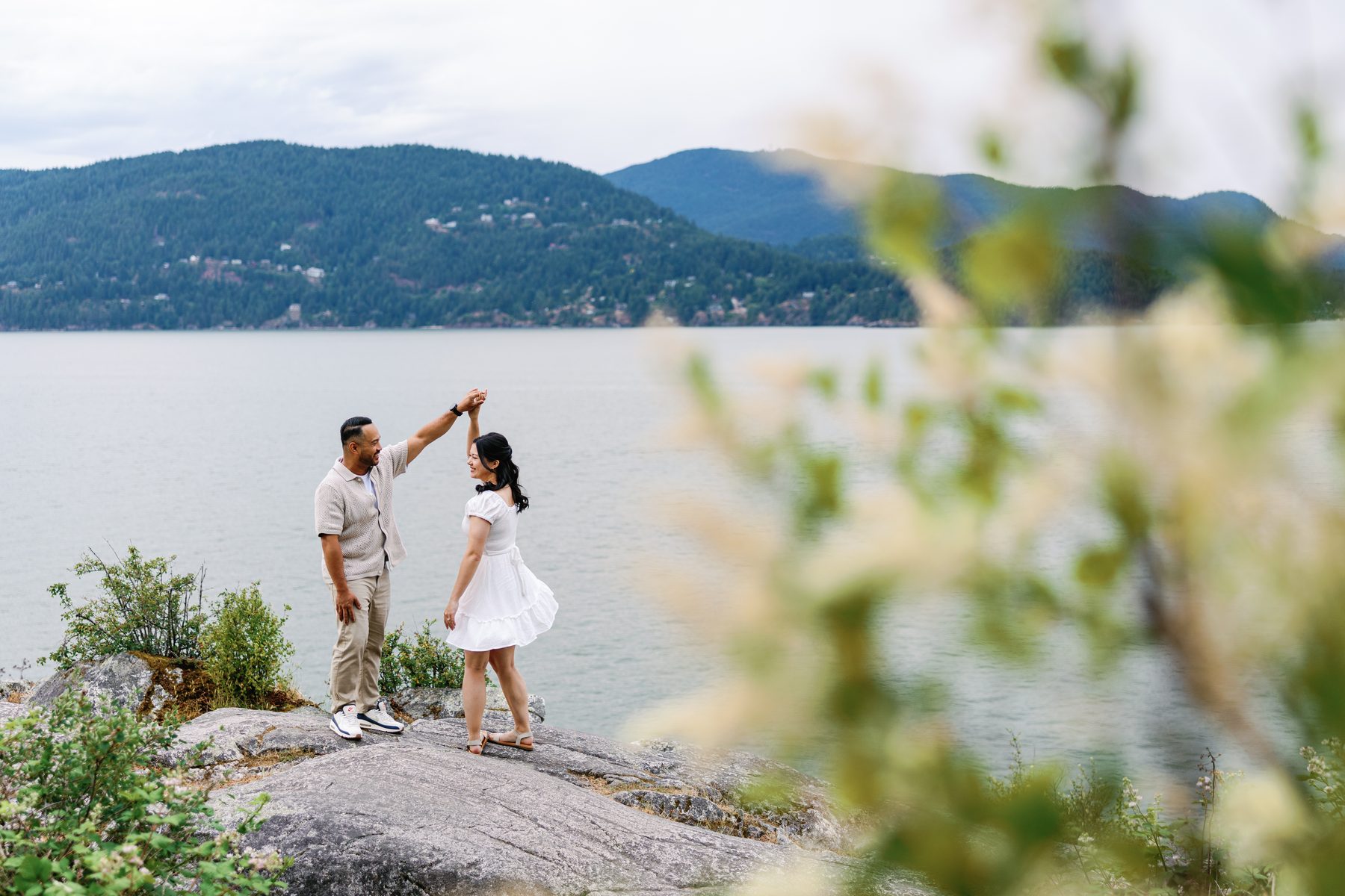 Engagement couple dancing on the rocks